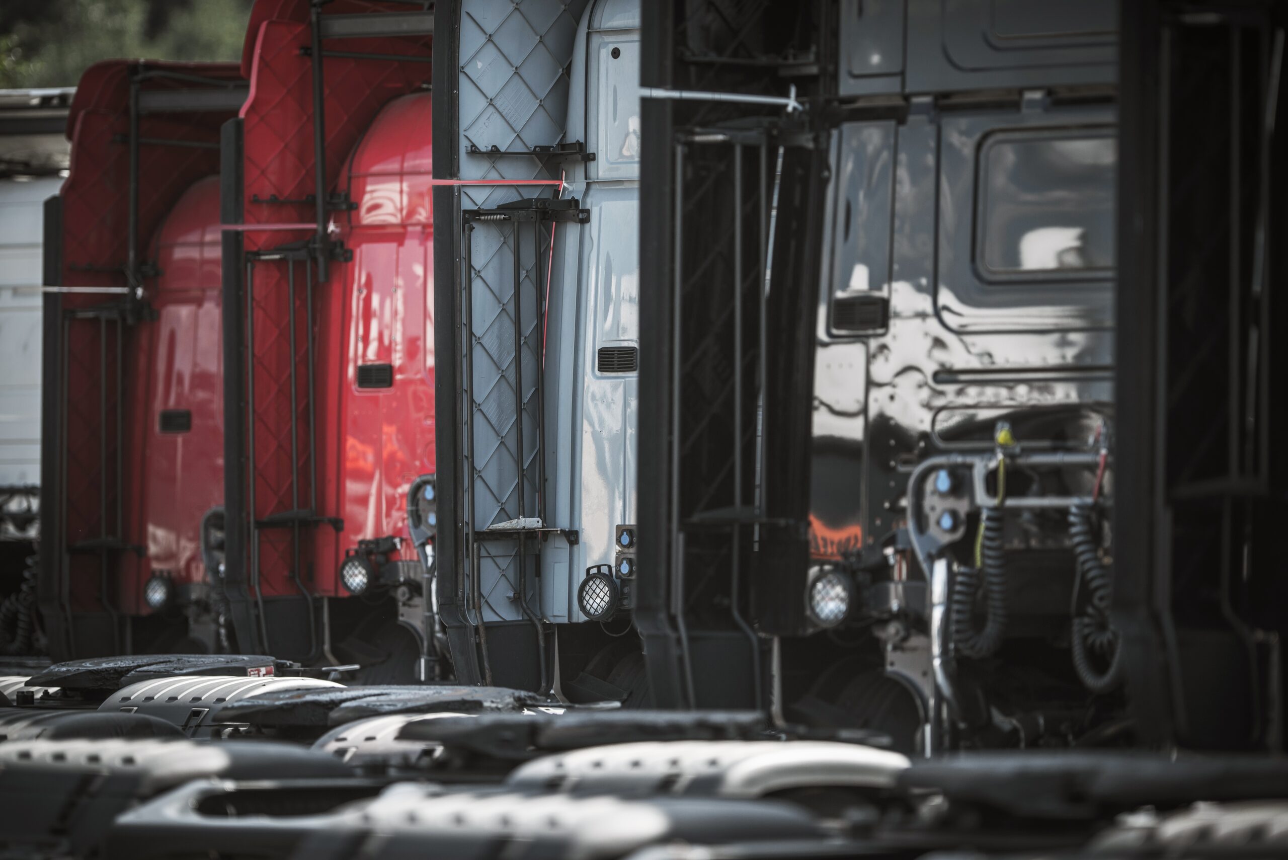 Semi trucks in a line from behind