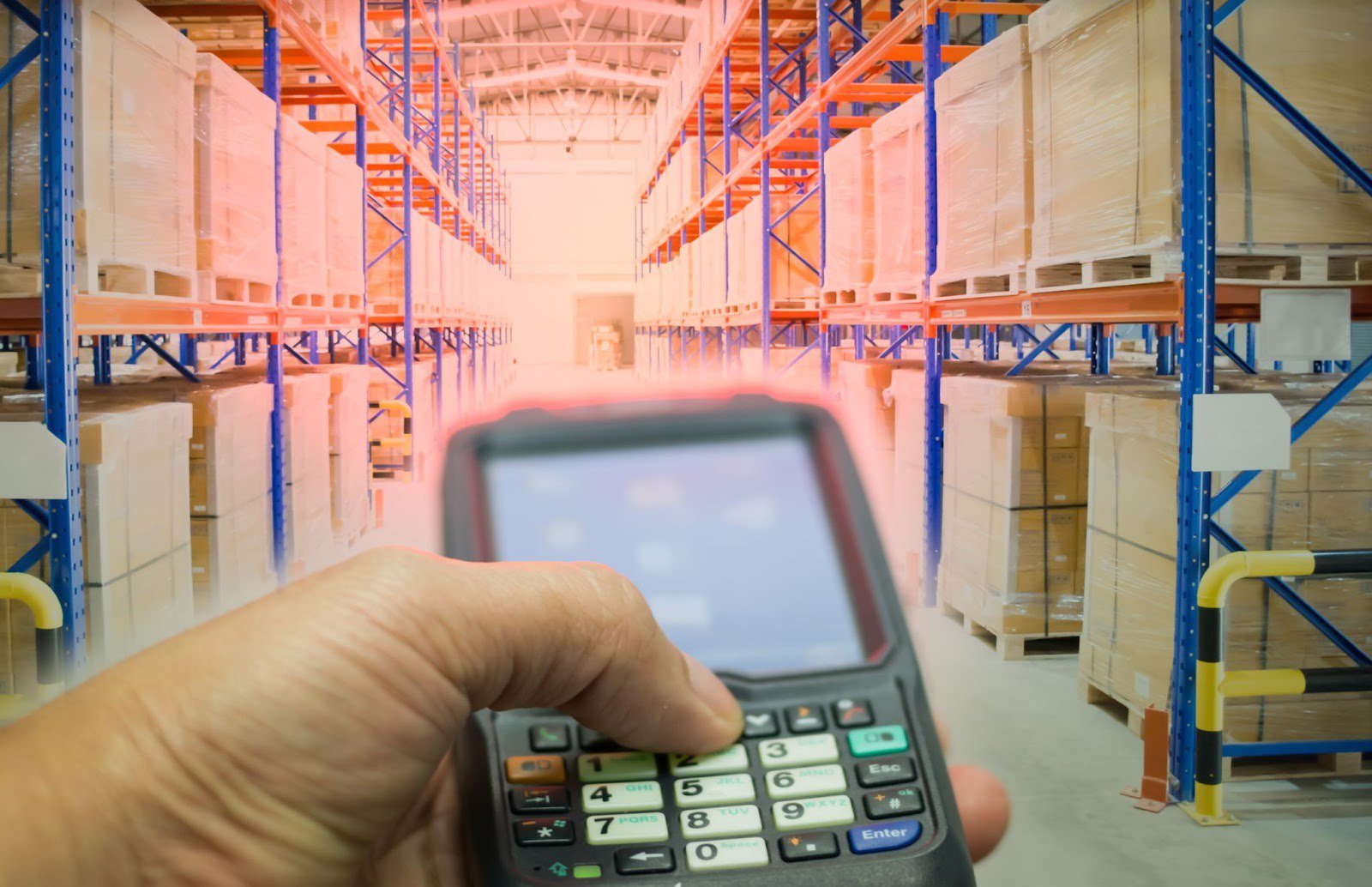 Close up press a button scanner barcode to inventory warehouse using RFID.